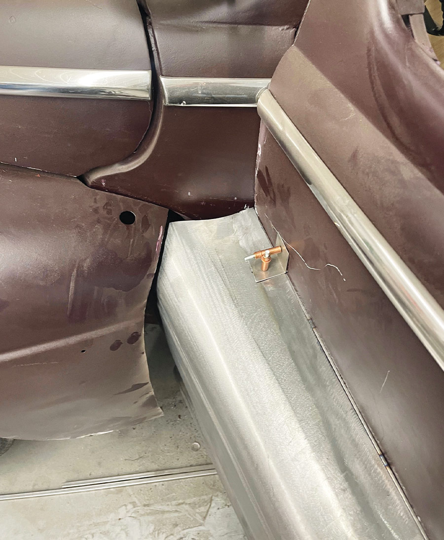 1947 Ford coupe close-up, cleco fastener attaching fadeaway fender panel near door edge