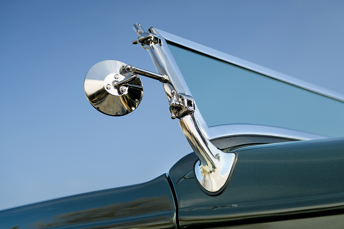 low angle view of a 1932 Deuce Roadster's passenger sideview mirror
