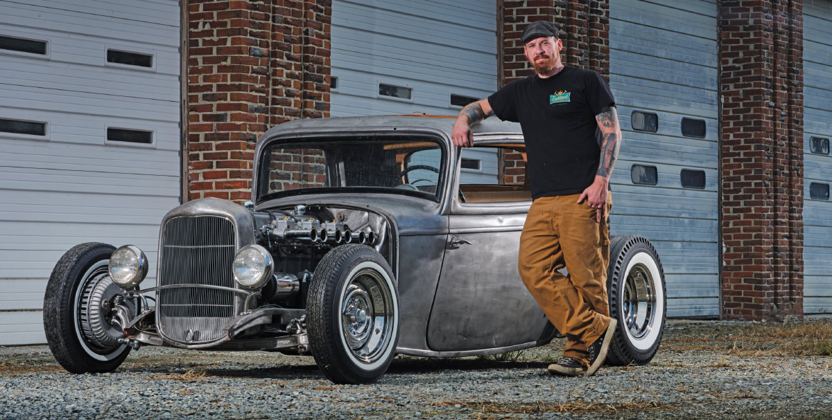 1932 Ford five-window hot rod in bare metal with whitewalls and early Hemi-style engine