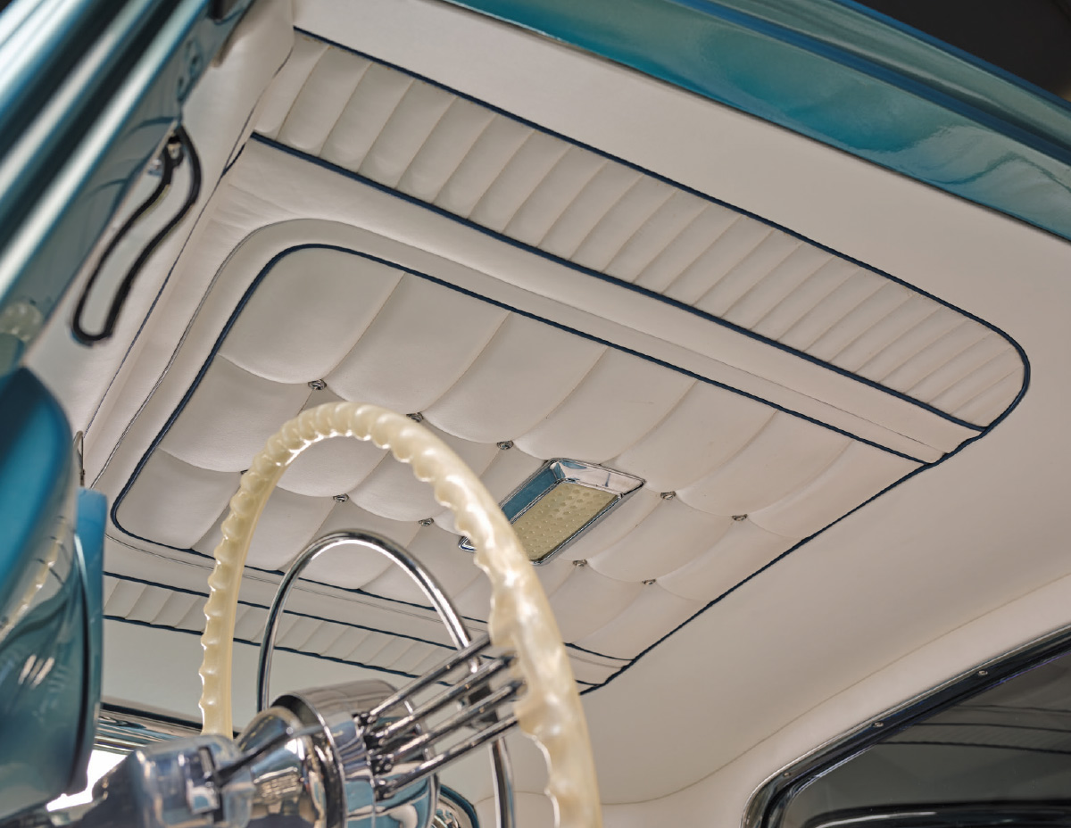 1932 Ford teal coupe white pleated headliner with blue piping and chromed dome light