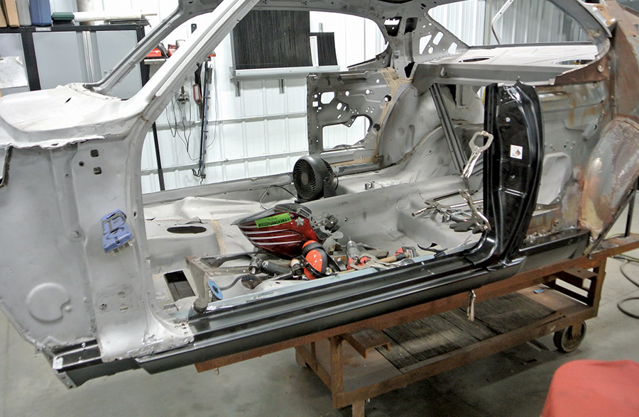 1971 Plymouth Duster side profile bare metal shell fabrication tools floor pan work professional restoration