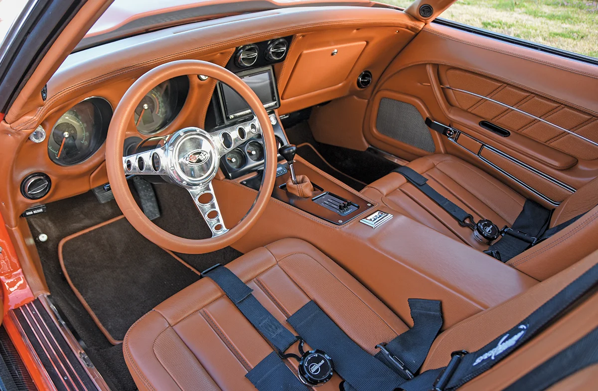 1968 Corvette interior tangerine leather aftermarket steering wheel modern infotainment restored gauges