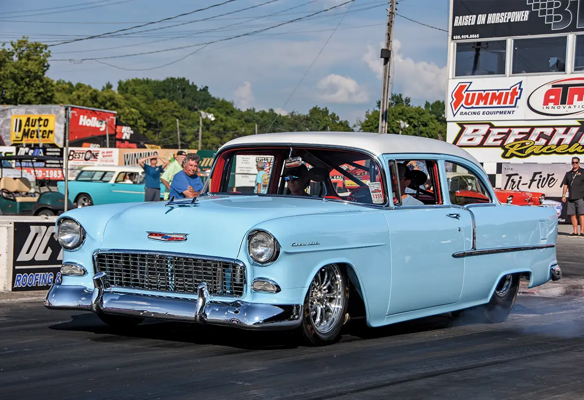 1955 Chevy 210 light blue and white Pro Street car on track chrome wheels race trim