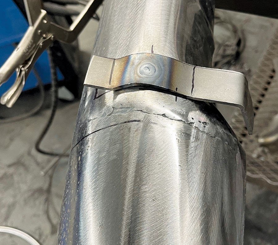 Custom mount made from 1/8-inch steel.