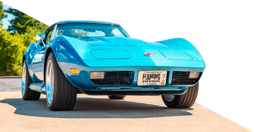 low angle view close front view of a blue Chevrolet Corvette C3