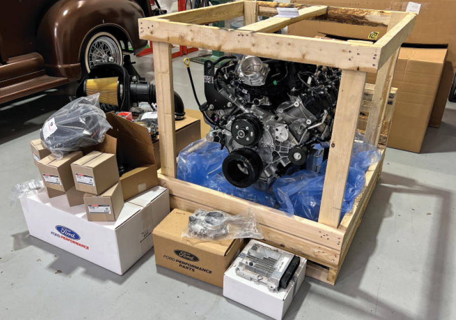 modern rodding project godzilla ford performance engine in shipping crate