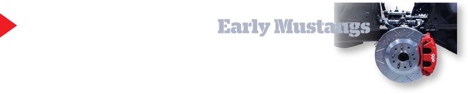 Performance disc brake assembly with a drilled and slotted rotor and red CPP caliper installed on an early Mustang chassis.