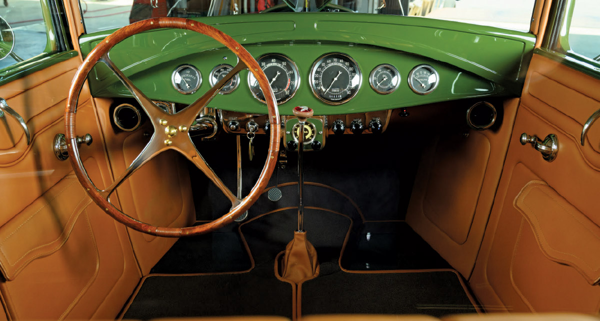 1931 ford coupe interior view green dash full sweep gauges wood wheel and tan leather trim