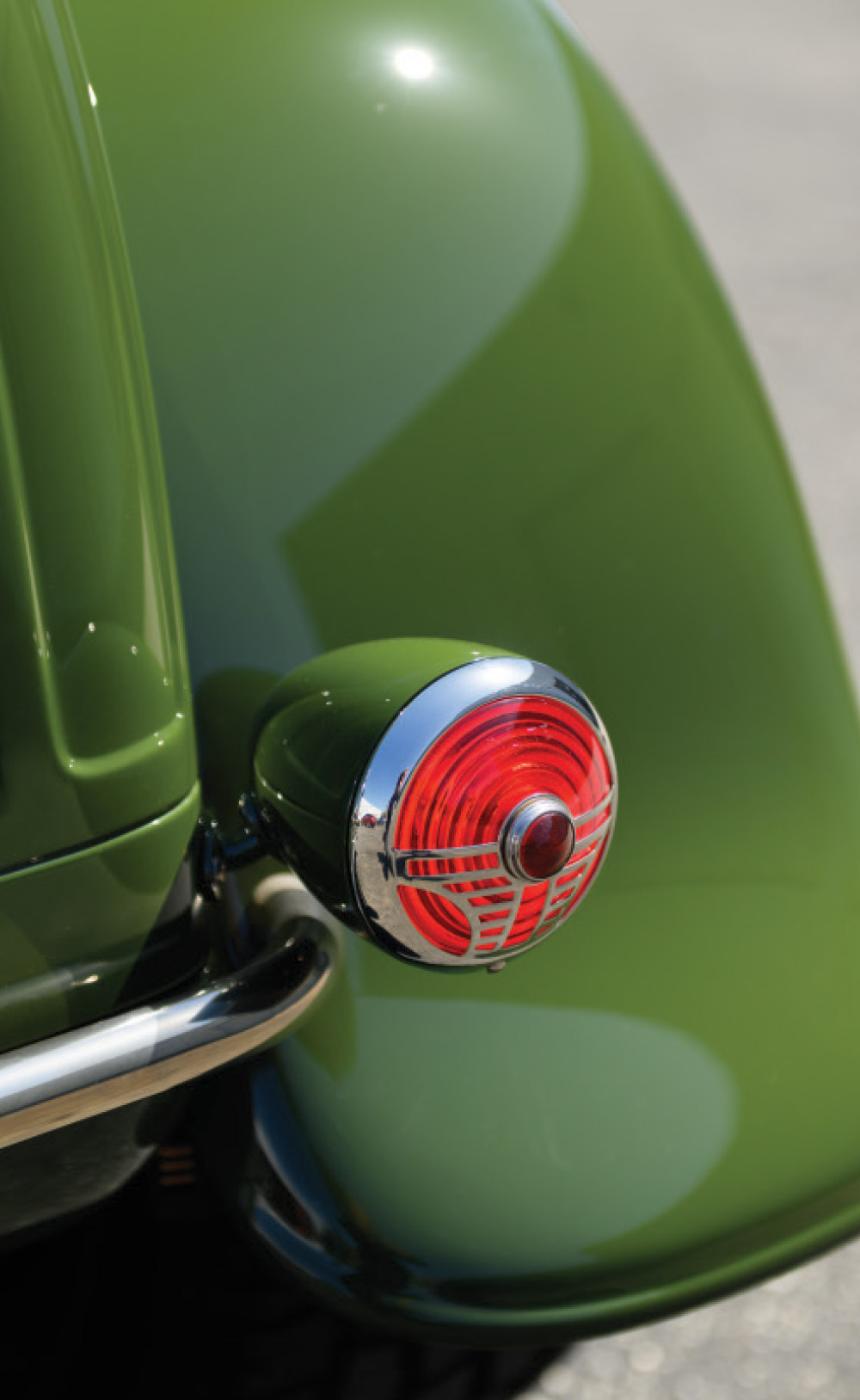 1931 ford coupe tail light close-up green fender chrome bezel classic red lens