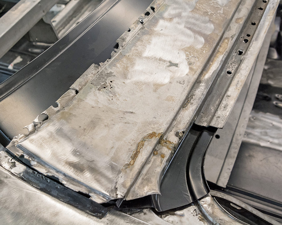 1971 challenger quarter panel weld seam metal shaping closeup