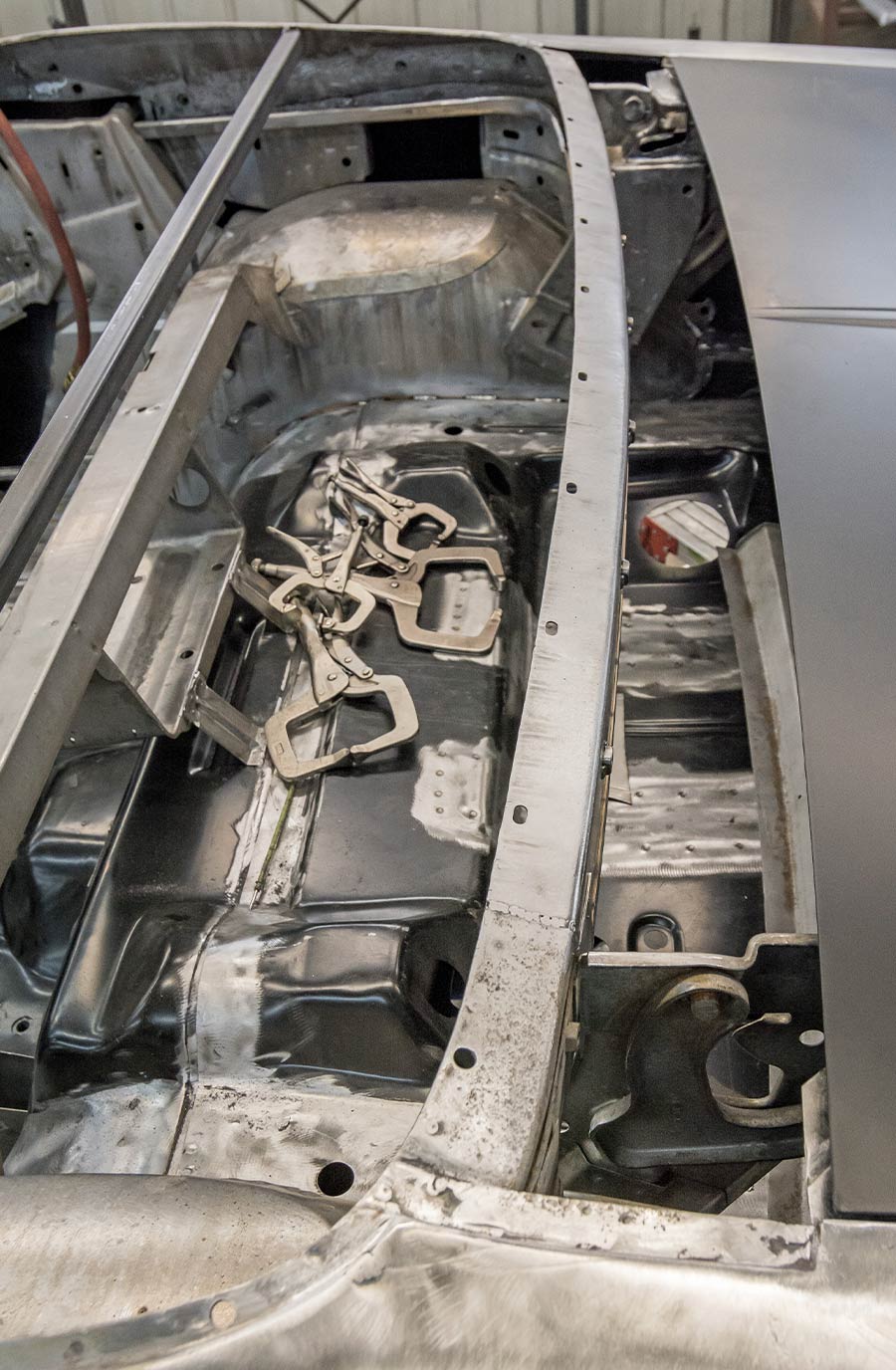1971 challenger trunk floor view clamps bare metal fabrication