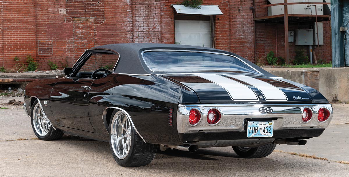 1971 Chevelle SS black white dual racing stripes rear three-quarter view chrome trim
