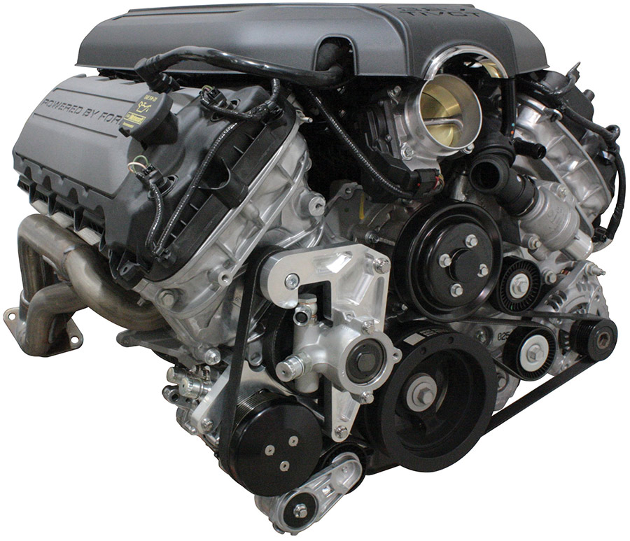 A Ford Coyote 5.0L V8 engine equipped with a Front Runner engine accessory drive system featuring a clear-anodized billet aluminum bracket, black pulleys, and a serpentine belt, isolated on a white background