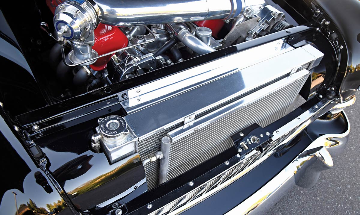 View of the radiator and intercooler setup behind the grille