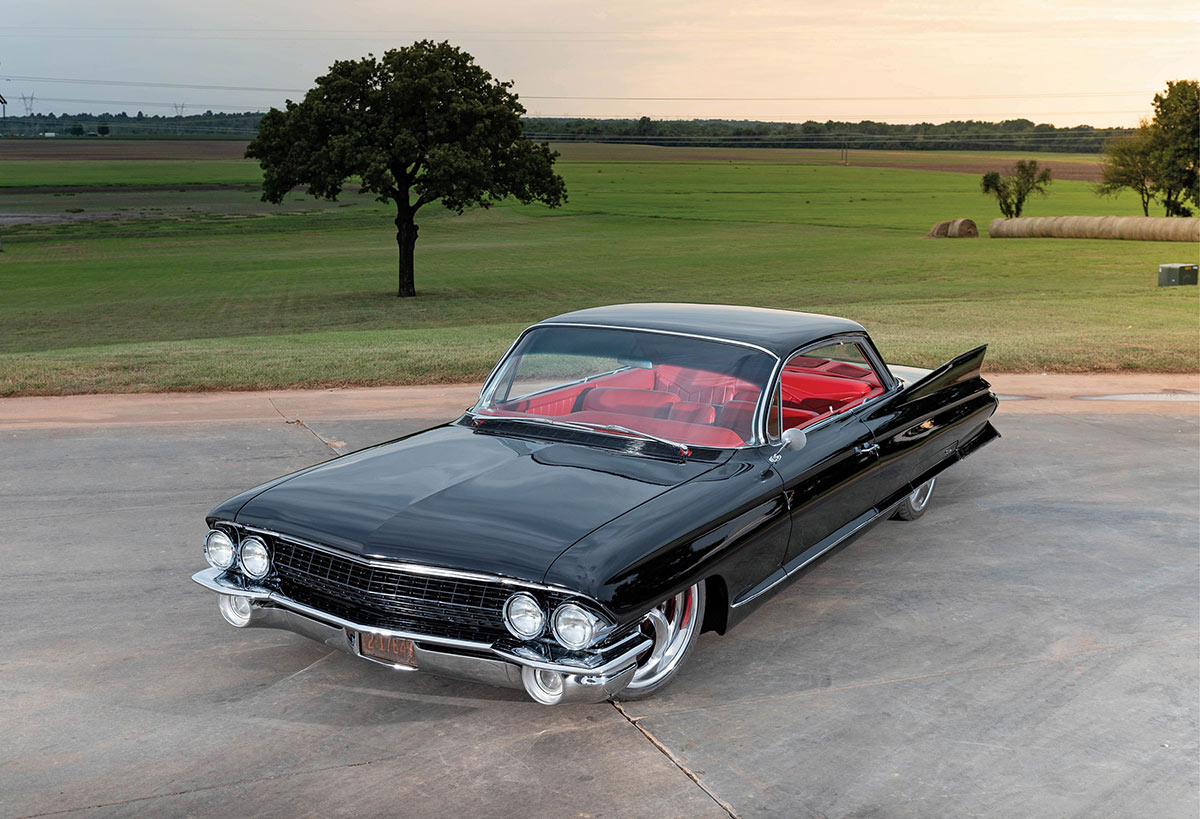 1961 Cadillac Coupe DeVille black custom lowrider high angle front view classic fins chrome grille