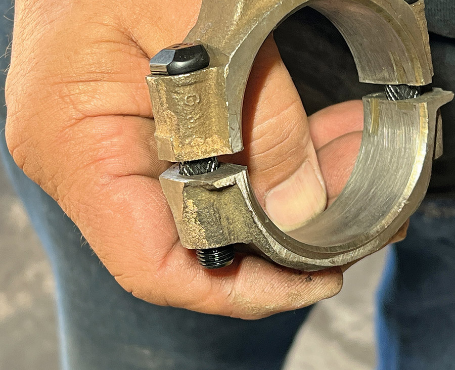 Close-up detail of installed engine connecting rod bolts