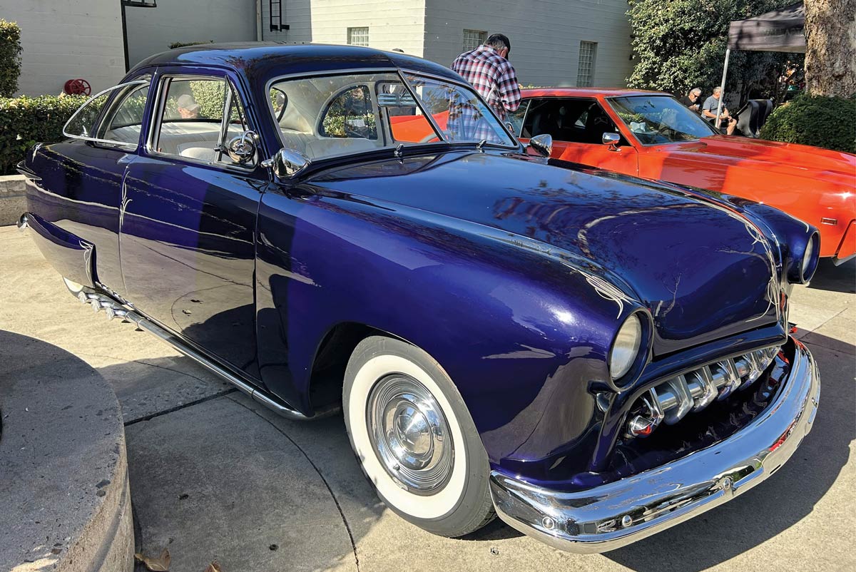 1950 Mercury Eight Coupe blue lowered chrome classic car outdoor show polished body style