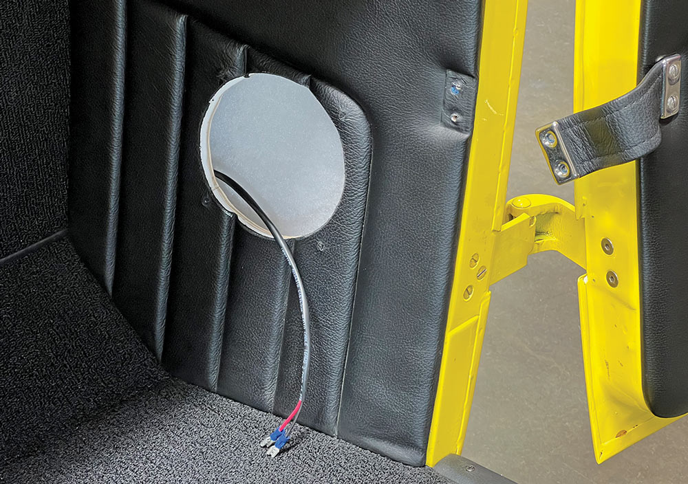 1932 Ford Roadster door panel speaker opening with wiring prepared for audio installation