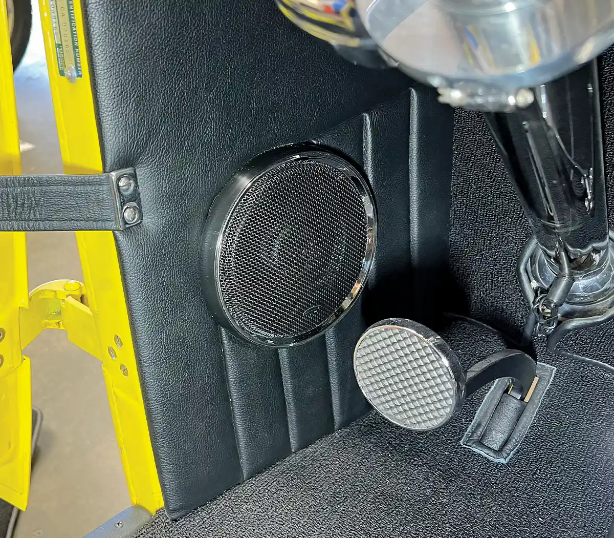 1932 Ford Roadster finished door panel with installed round speaker grille and custom interior trim