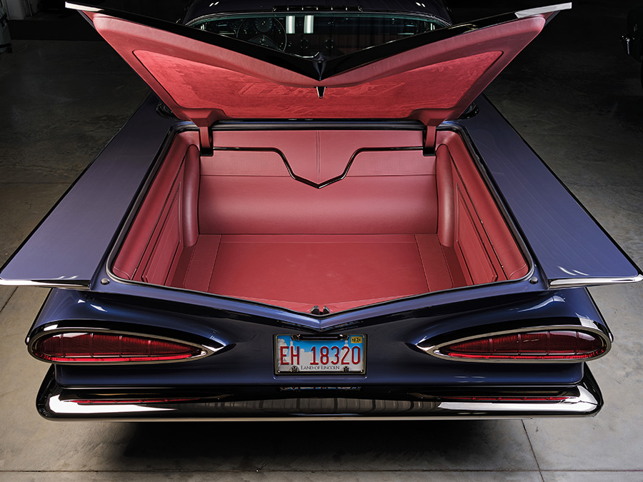 Custom upholstered red leather trunk of a 1959 Impala.