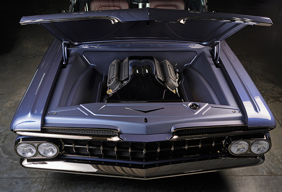 Open hood view revealing the fully detailed engine bay.