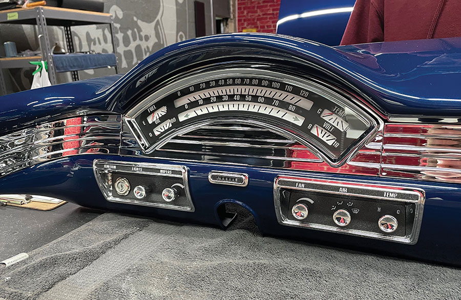 Instrument cluster and switches in blue dash.