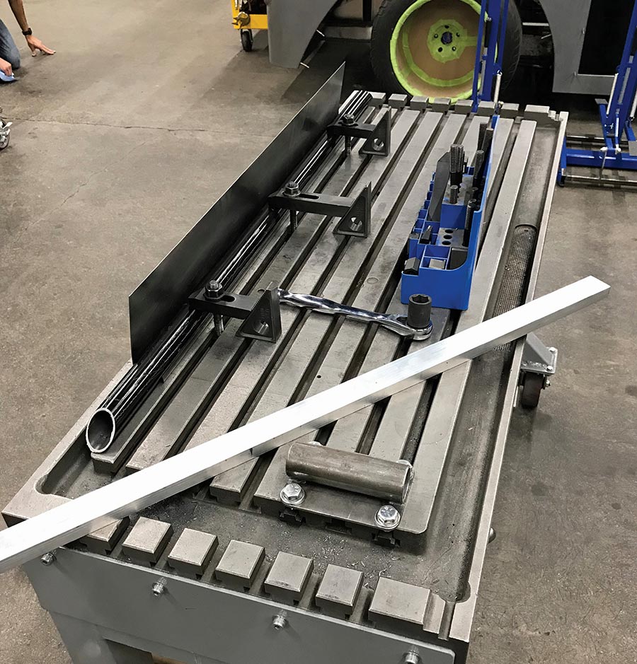 Tubing and clamp fixture for metal forming.