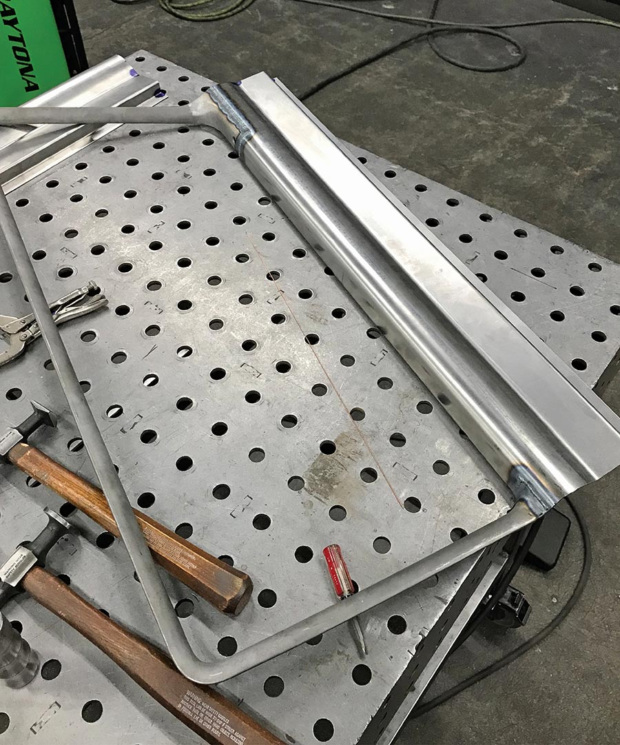 Interior window trim spliced and tack welded.