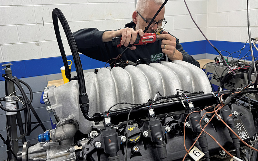 Brian Wolfe bolting the Holley intake manifold to the Godzilla engine.