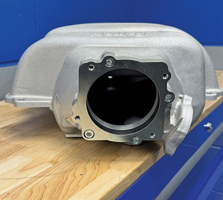 Front angle of the Holley intake showing the spacer plate.