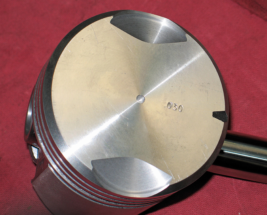 Piston for a blown 392 Hemi with valve reliefs.