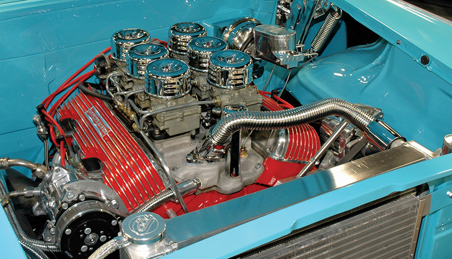 Offenhauser manifold with six carburetors on 409.