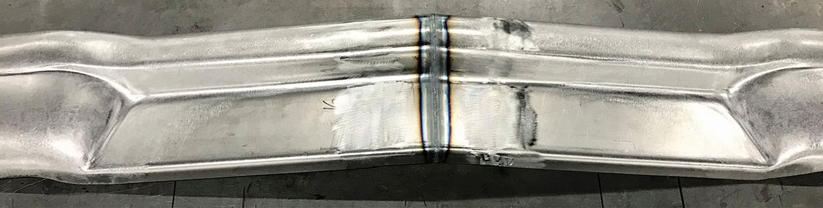 Joined bumper section showing weld seam