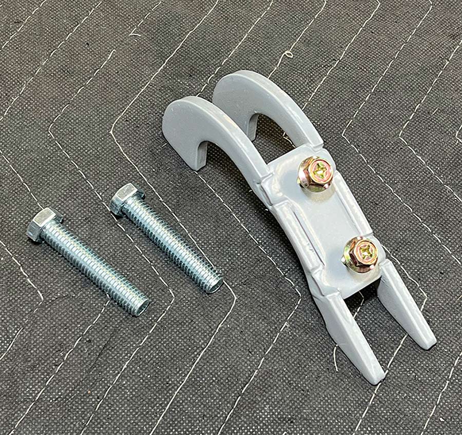 Metal bridge bracket for the fuel level sender.