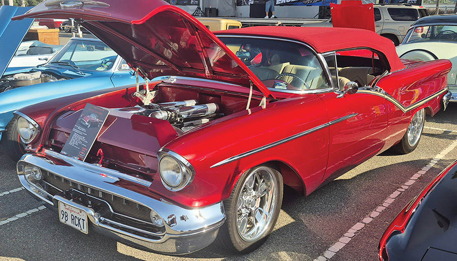 Front of a red 1957 Oldsmobile 98 Starfire convertible