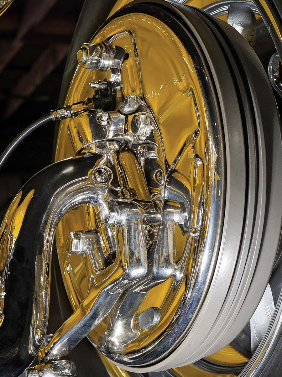 Polished front suspension and Super Bell drop axle.