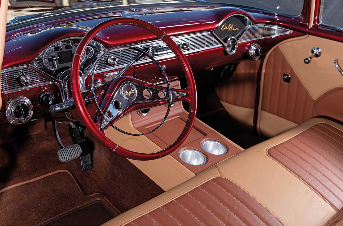 Interior dash and steering wheel in red and tan