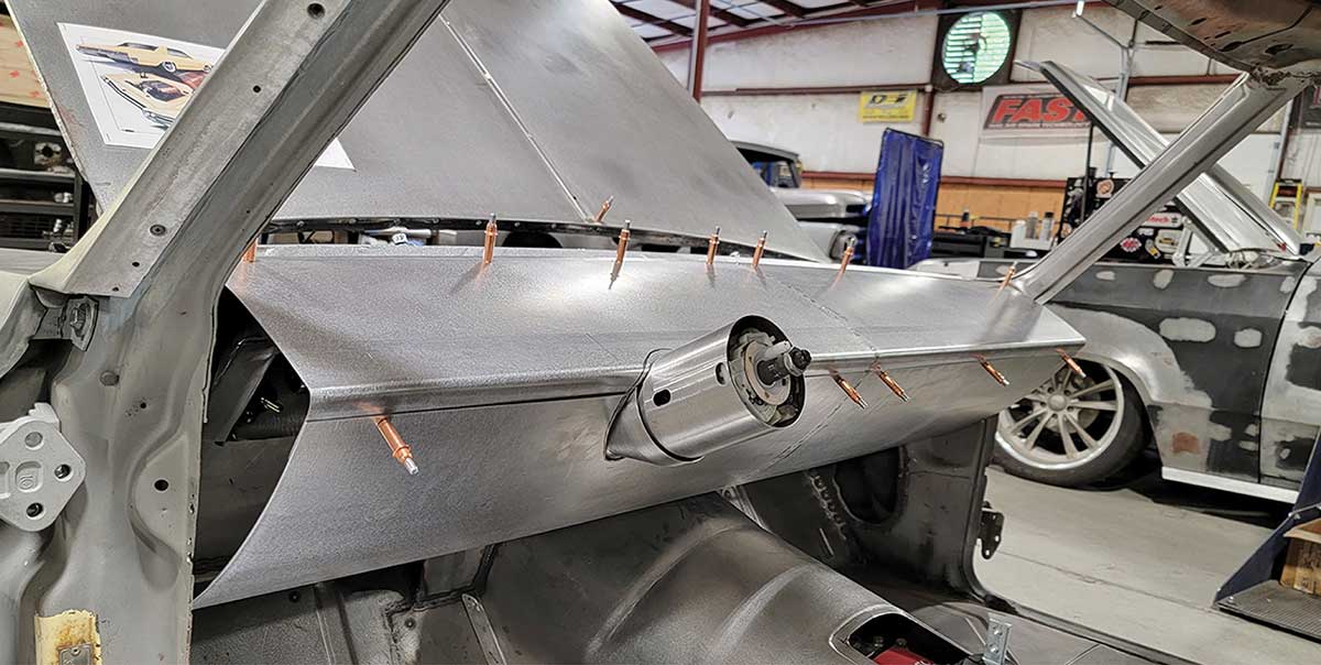 Dashboard panels joined and trimmed around the steering column.