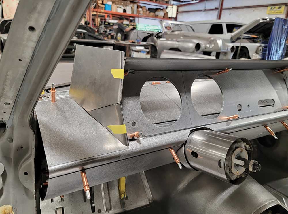 Added metal on left side of instrument cluster.