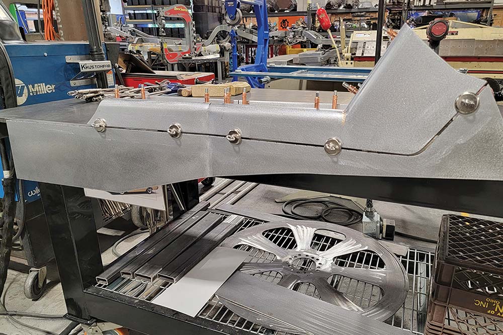 Trial-fitting console spacer pieces with magnets.