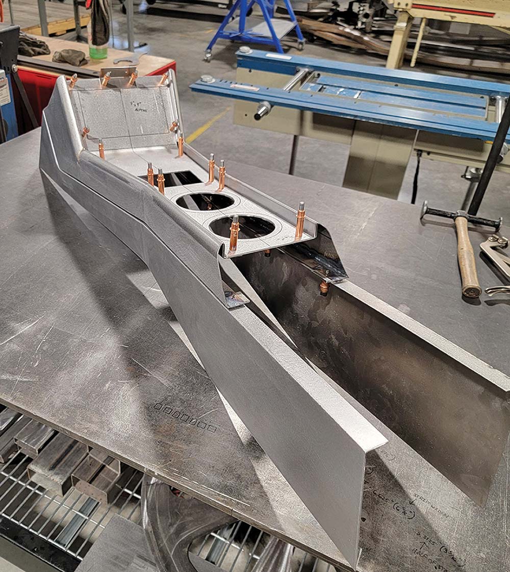 Trimming top center section of console to final size.