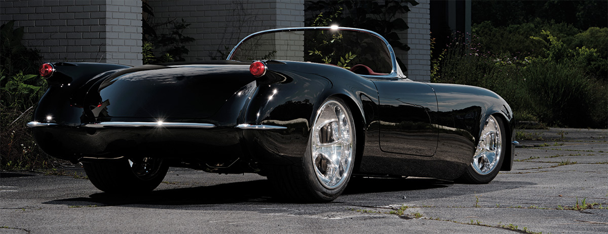 Rear view showing custom bumpers and chrome license plate surround.