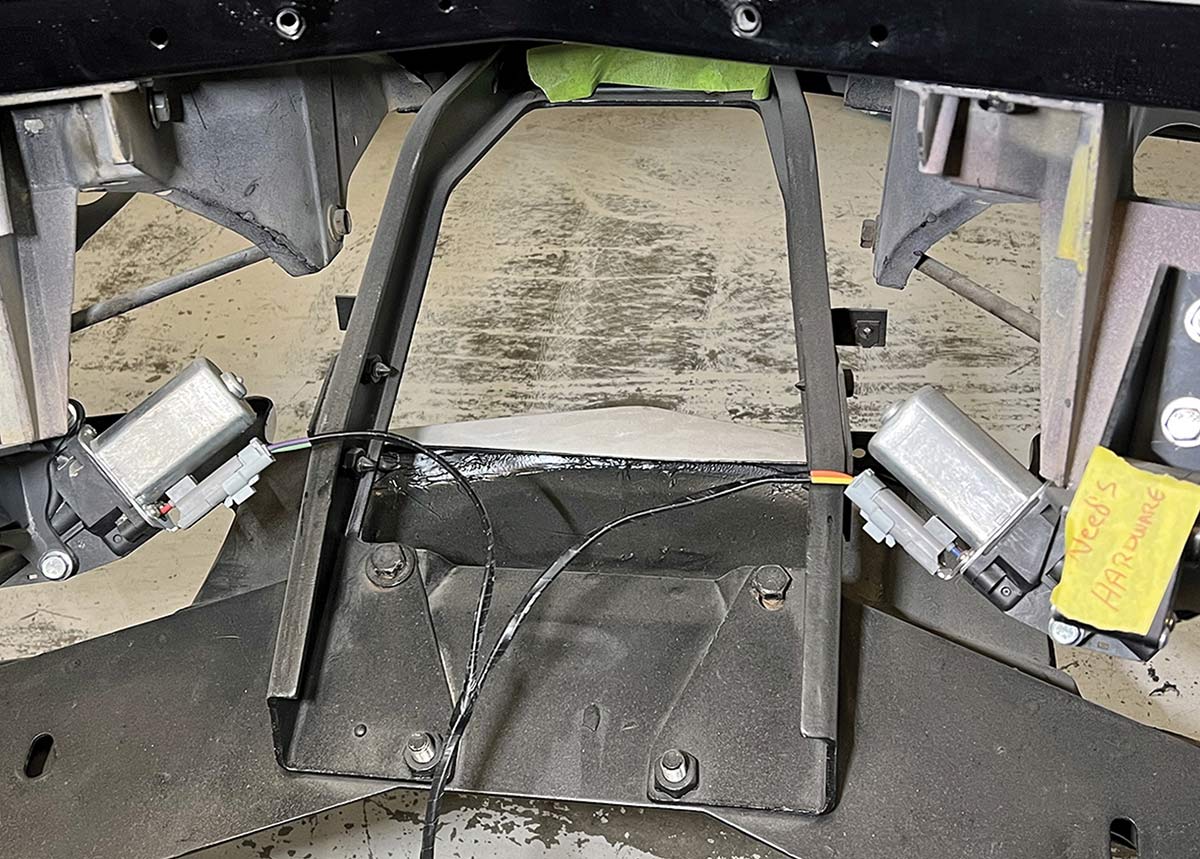 Under-car wiring and actuators.