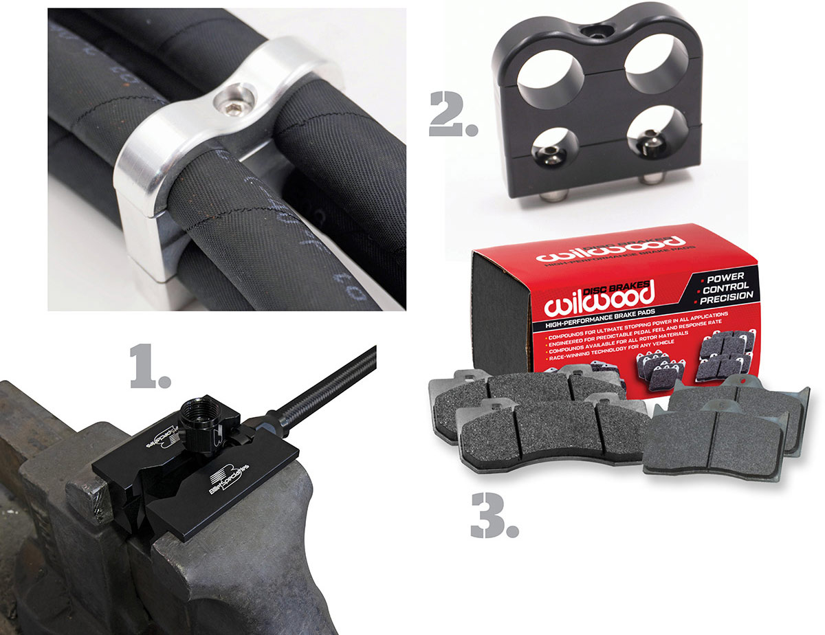 Composite of aluminum vise jaw inserts, quad line clamps, and Wilwood brake pads.
