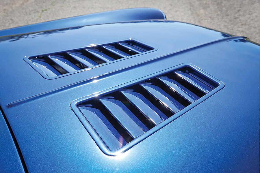 Close-up of flush-mounted custom hood scoops on the Nomad.
