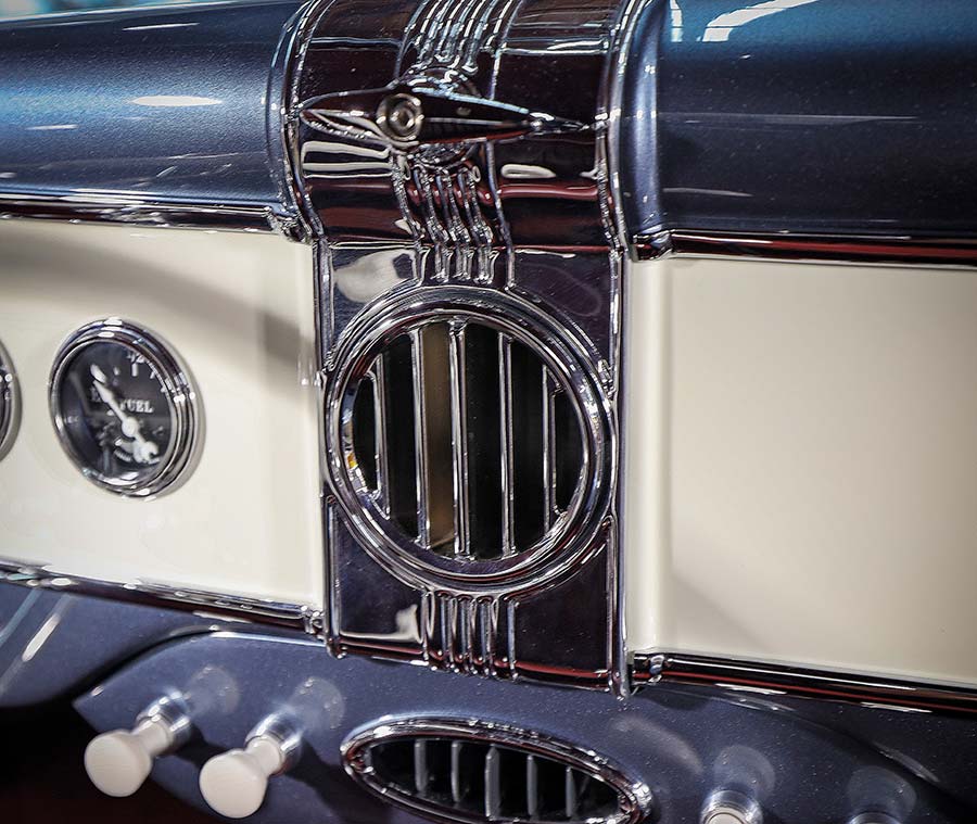 Detail of the chrome-plated custom dashboard center trim.