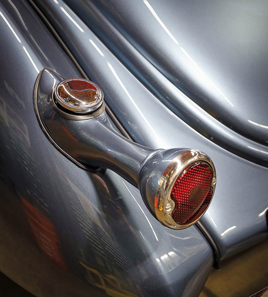 Detail of the integrated gas filler within the shortened taillight housing.
