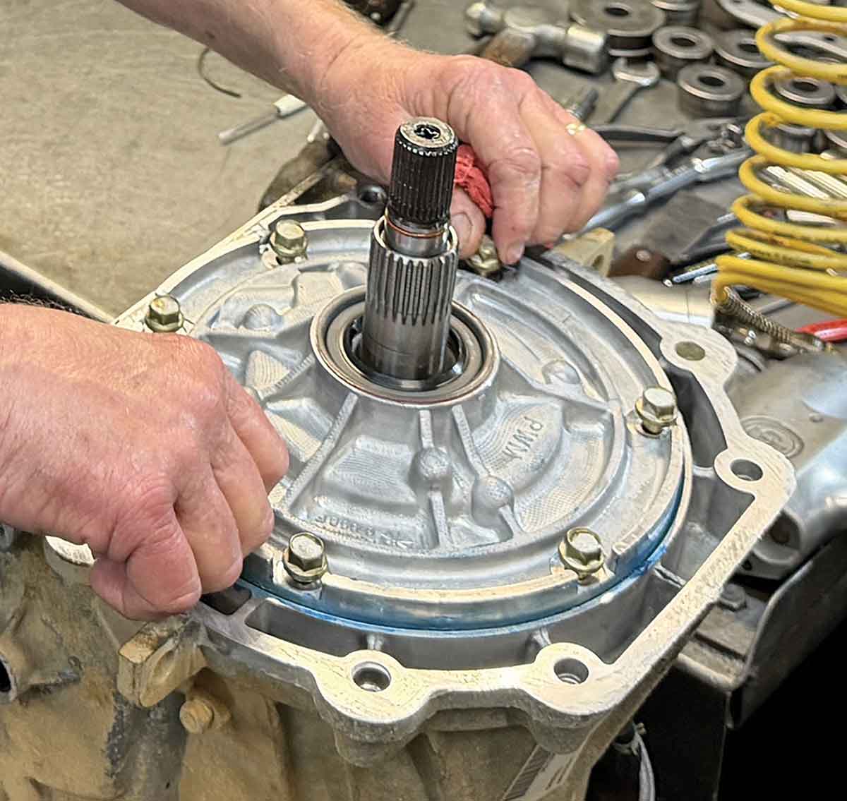 Applying the front seal to the rebuilt pump.