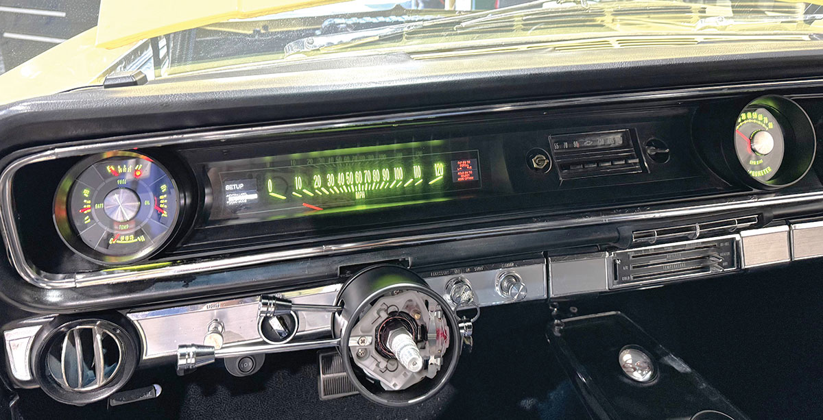 Completed dash installation showing the illuminated RTX gauge cluster.