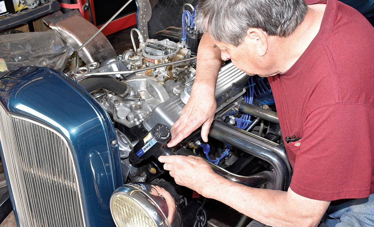 Timing light used on a classic blue engine.